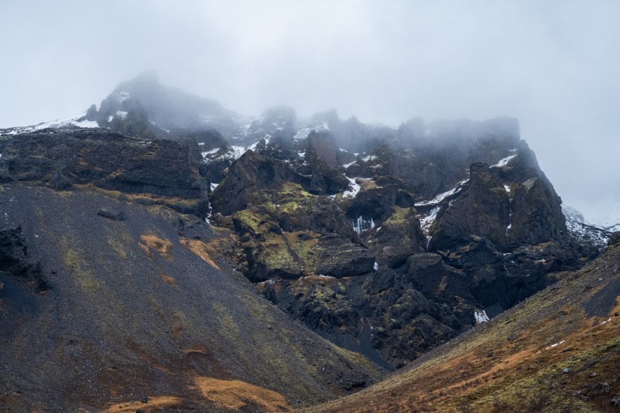 Fog drifting over Hofskirkja Mountain